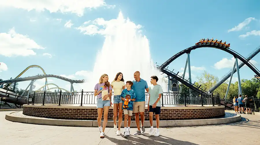 Family in front of fountain at Hersheypark