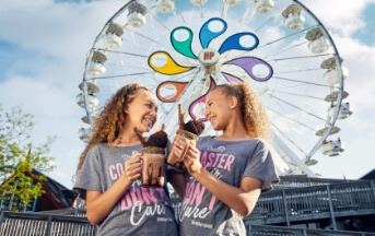 Girls with desserts in front of ferris wheel at Hersheypark