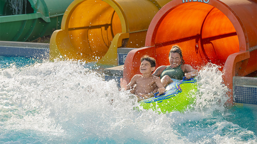 Mom and son riding Hydro at The Boardwalk