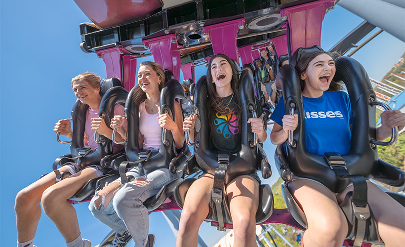 Family with Hershey Bar character at Hersheypark