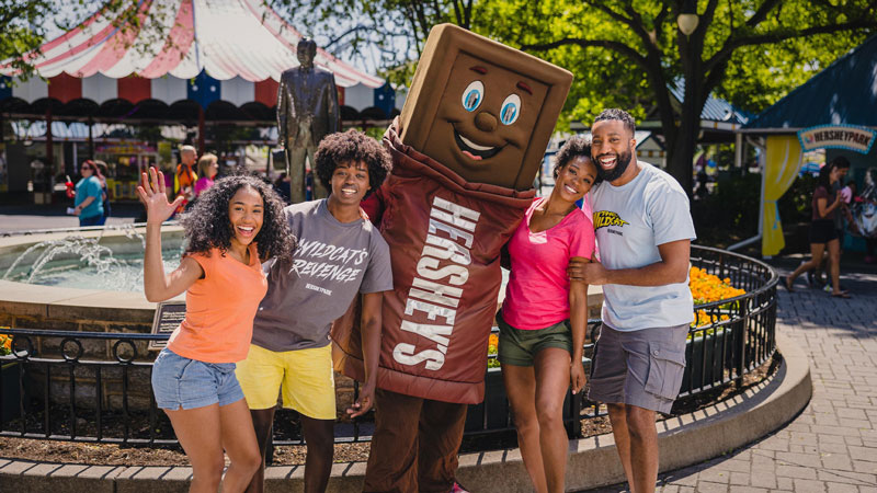Family with Hershey Bar character