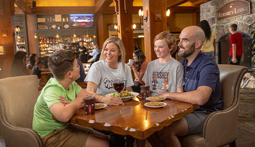 Family seated at Hershey Lodge